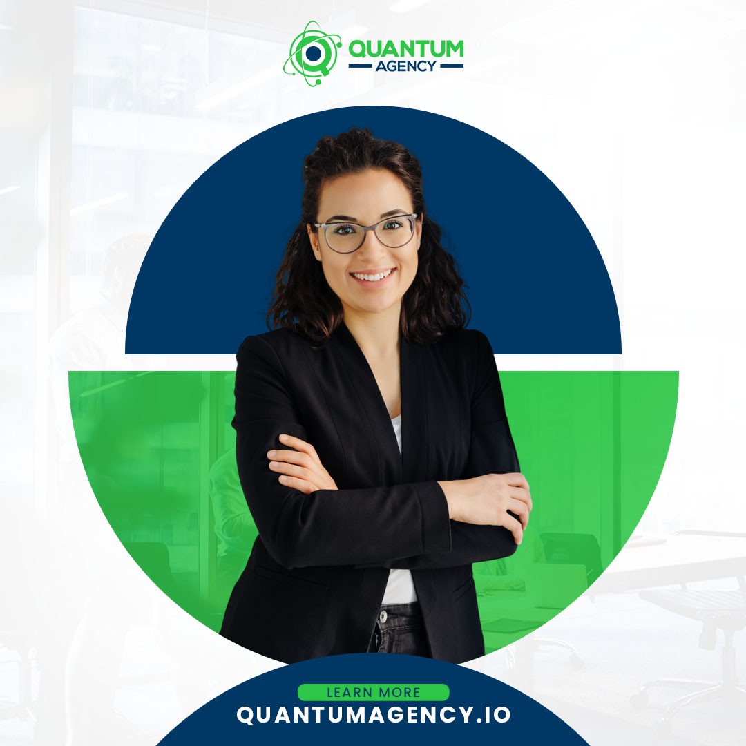 Promotional PR graphic for Quantum Agency showing a smiling businesswoman with glasses and curly hair standing with arms crossed. The central image is isolated inside a split blue and green circle against a faint office background. Includes the Quantum Agency logo and a website link for quantumagency.io at the bottom.