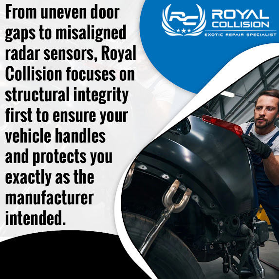 Technician aligning vehicle body panel to restore structural integrity after collision