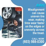 Technician Fixing Misaligned wheel (1).jpg