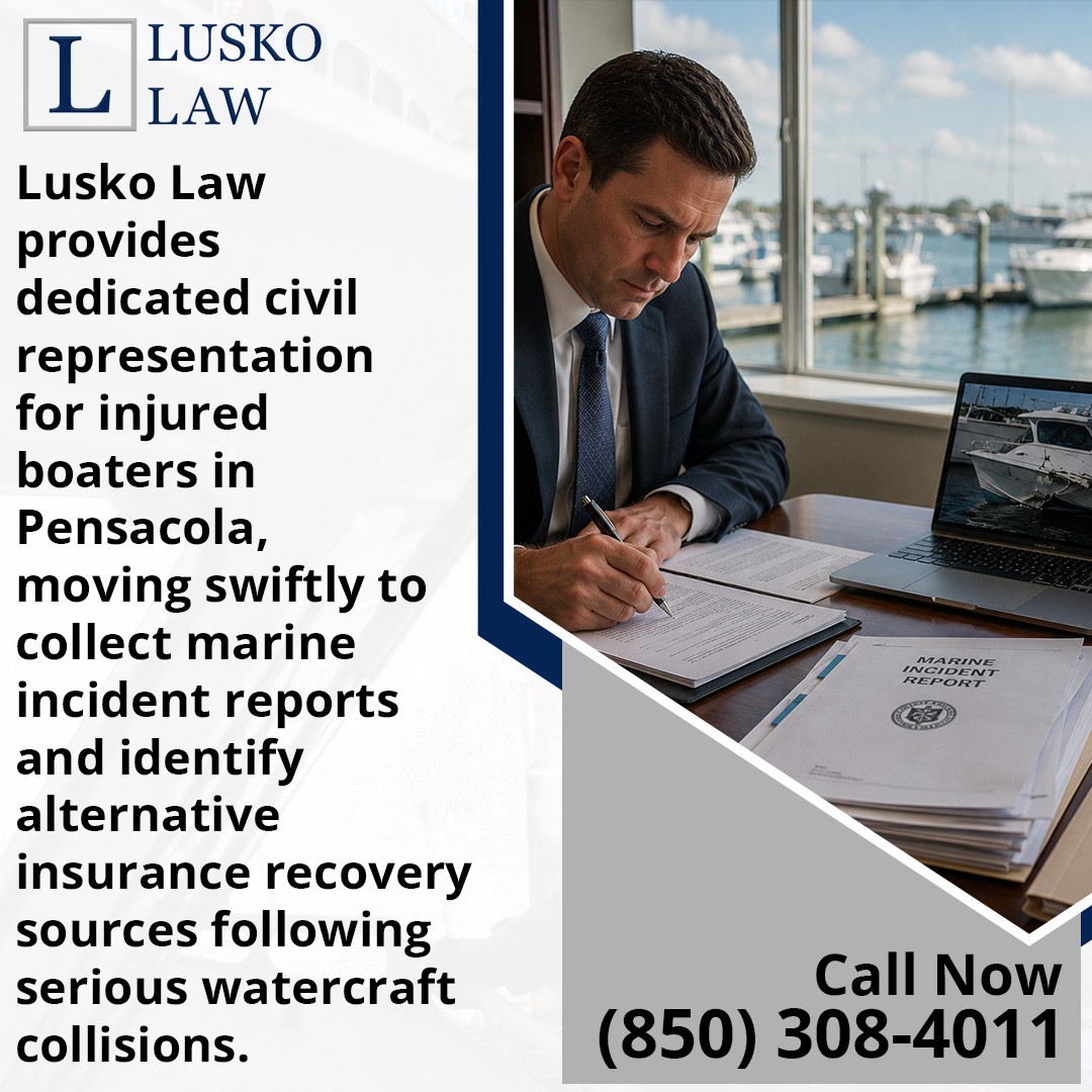 A male lawyer in a suit reviewing documents at a desk next to a laptop displaying a damaged boat, with watercraft collision ad text.